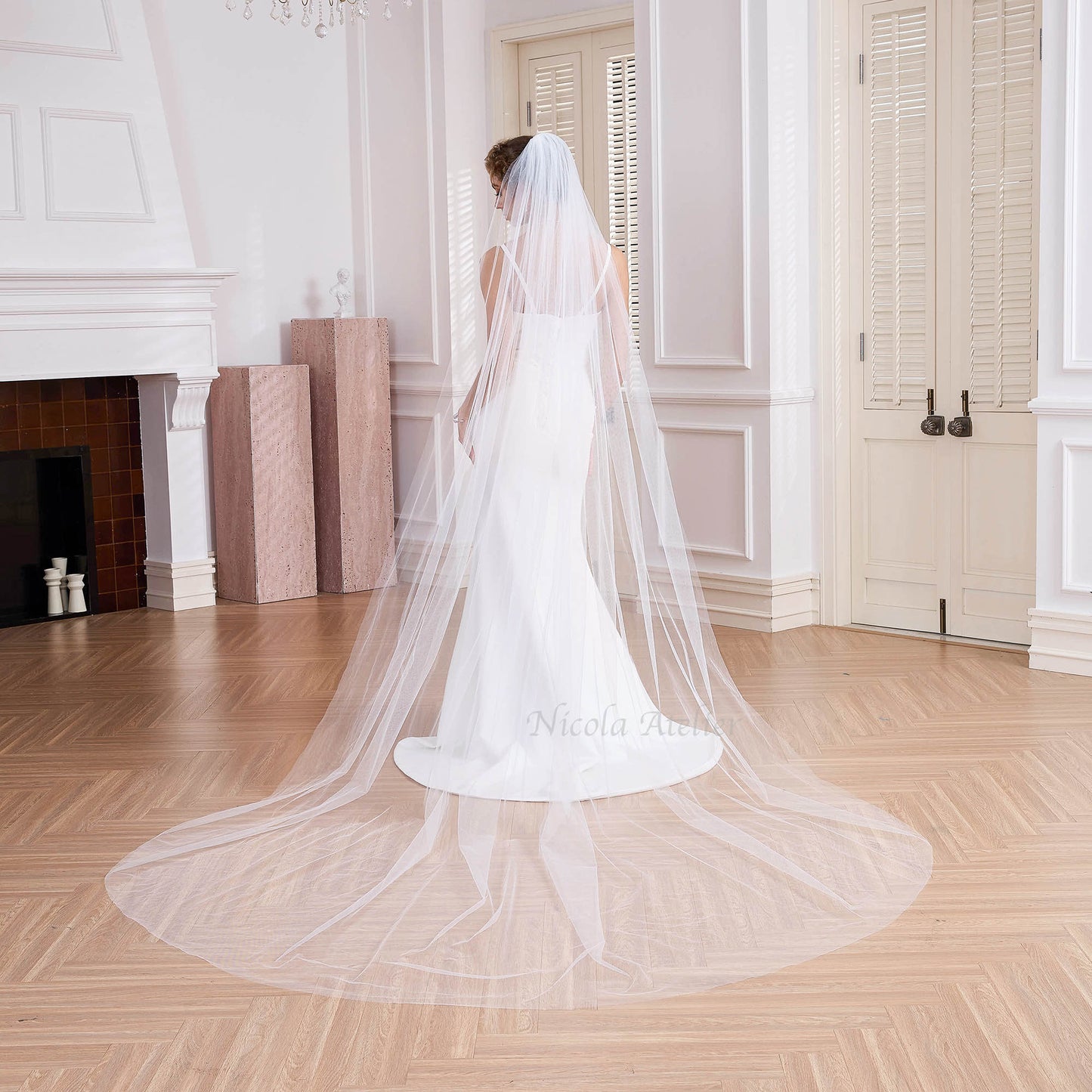 Back view of 3m cathedral veil sweeping across wood floor, dramatic ceremony entrance,